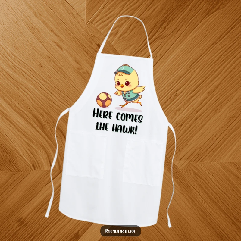 Funny chick chef apron featuring a determined bird in uniform lunging for a ball, ideal for kitchen adventures and humorous cooking.