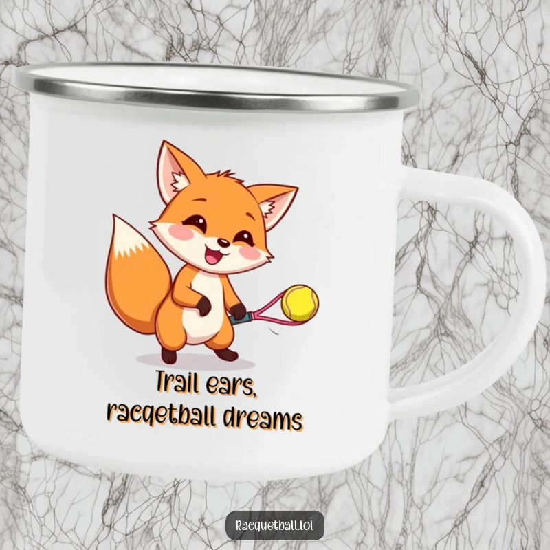 Funny camping mug portraying a happy fox catching a bouncing racquetball, ready for outdoor fun and coffee breaks.