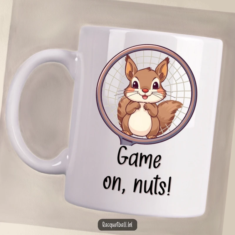 Funny squirrel mug showing a playful squirrel peeking through a large tennis racquet frame, highlighting sports and humor.