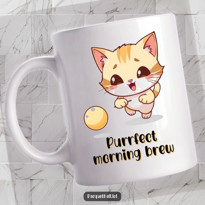 Funny mug showing a giggling cat character intensely focused on chasing a bouncing ball with playful glee.