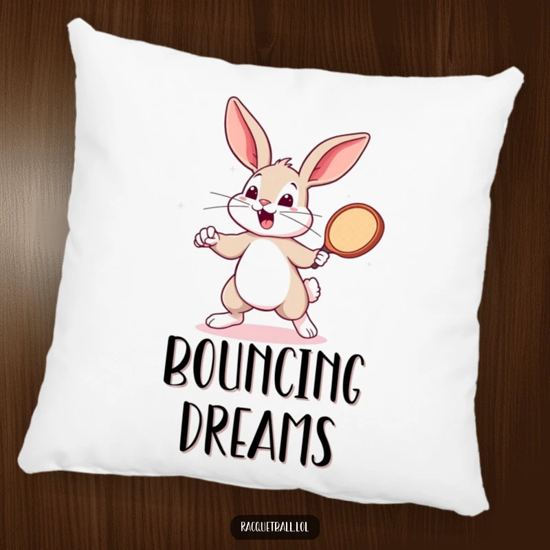 Funny bunny with a racquetball paddle on a soft pillow. A sporty funny gift for comfort.