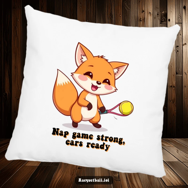 Funny pillow showcasing a happy fox with perked ears, catching a bouncing racquetball, emphasizing comfort and playful gaming action.