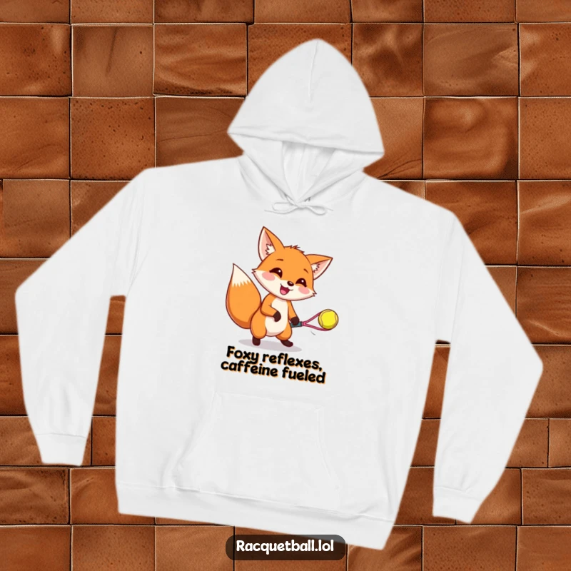 Funny hoodie showing a happy fox concentrating on catching a bouncing racquetball, radiating excitement and playful gaming spirit.
