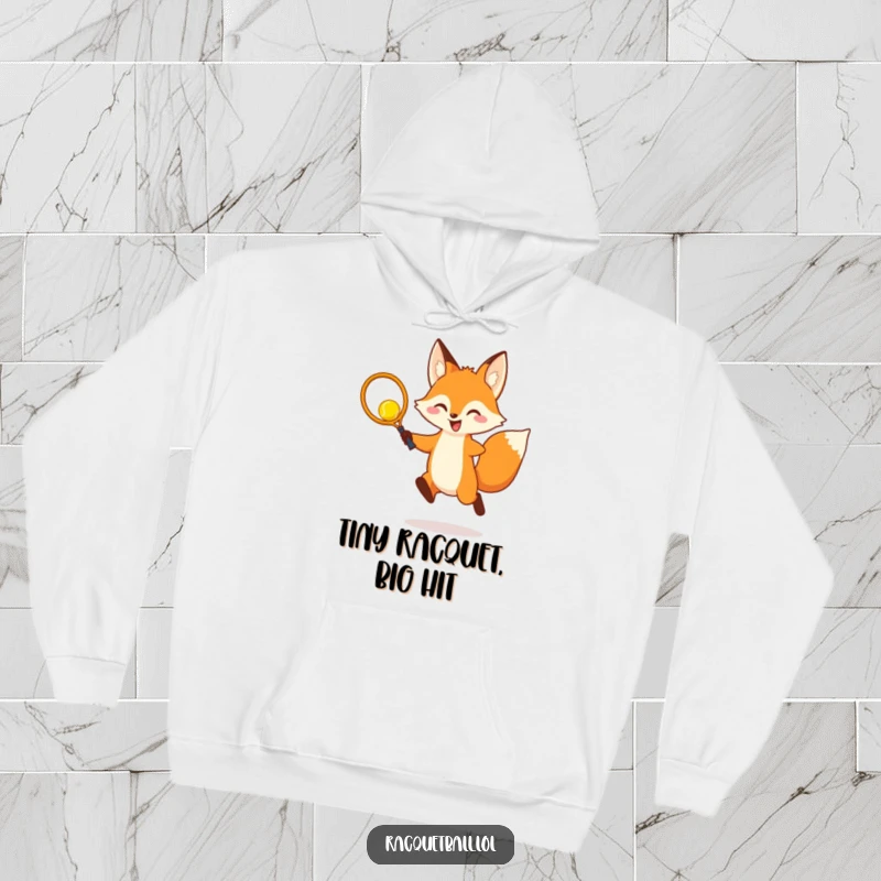 Funny Hoodie: A cheerful fox in mid-air, swinging a tiny racquet to hit a yellow racquetball, exuding pure joy and sportiness.