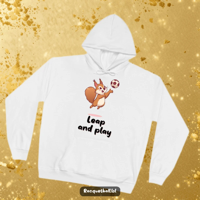 Funny, cozy hoodie featuring a determined squirrel leaping high and hitting a ball with a playful smile.