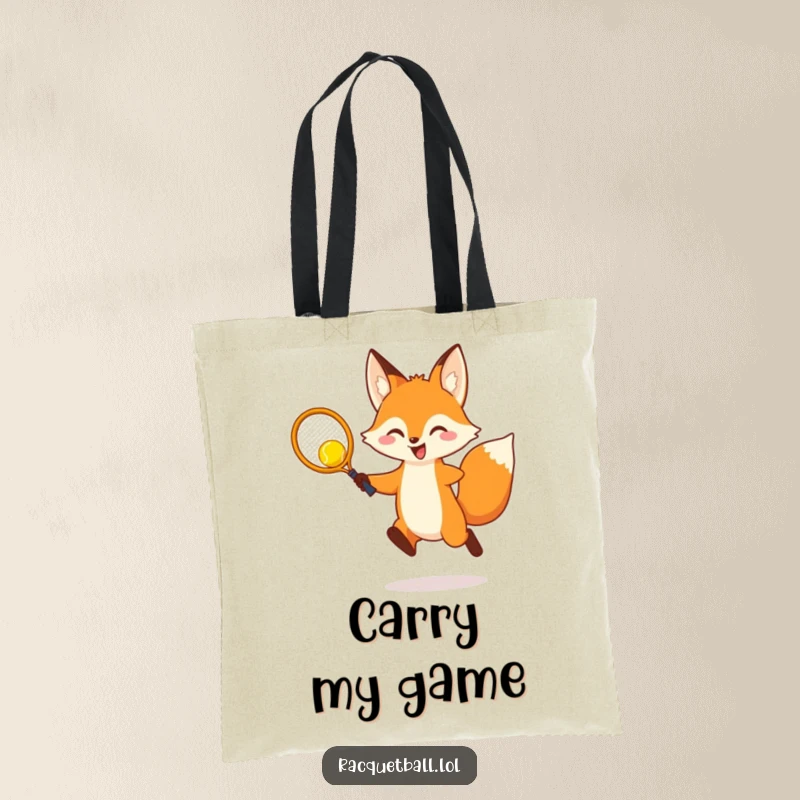 Funny Tote Bag: A cheerful fox leaping to hit a yellow racquetball with a tiny racquet, perfect for carrying daily items with style.