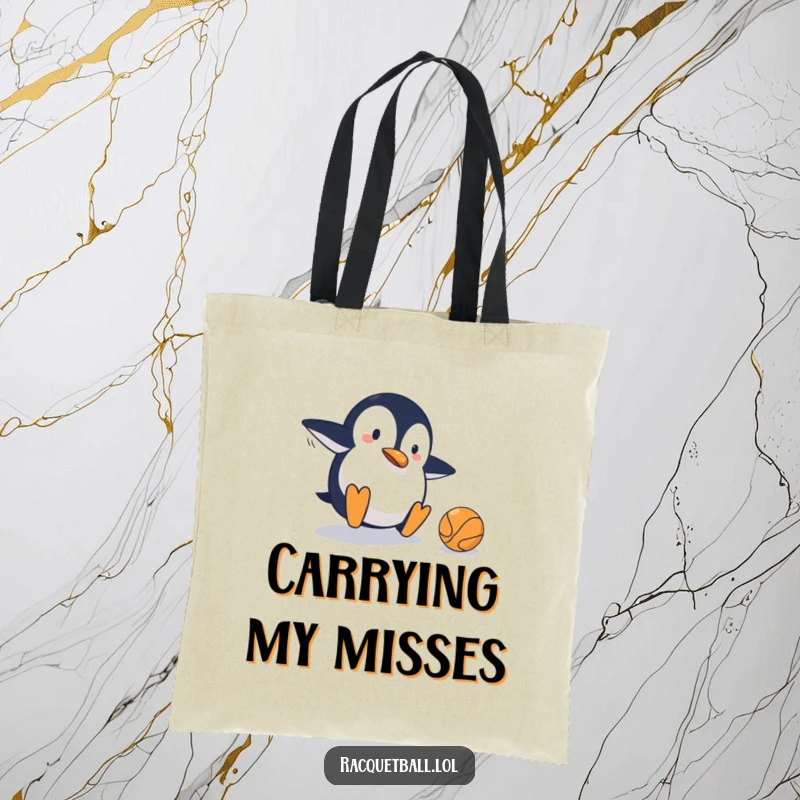 Funny tote bag with a clumsy penguin sliding on a tennis court, narrowly missing the ball, ideal for carrying gear with humorous intent.