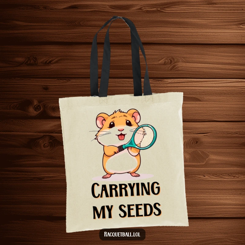 Funny tote bag showcasing a determined hamster character swinging a miniature plastic tennis racquet, carrying capacity.