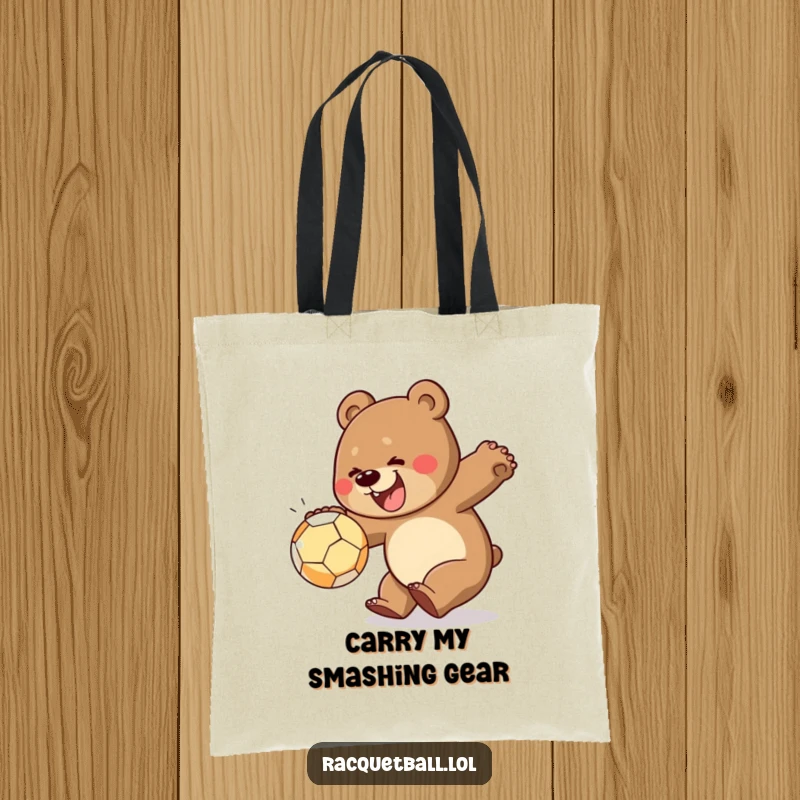 Funny tote bag featuring a cheerful bear preparing to smash a ball, ideal for carrying items with a dose of energetic humor.