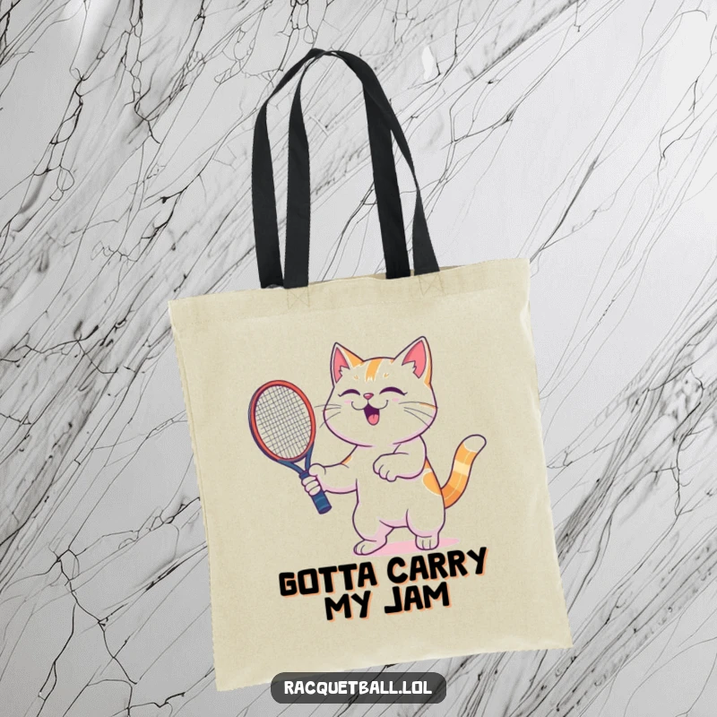 Funny cat tote bag illustrating a jubilant cat energetically shaking a racquetball racquetboard with pure, unadulterated glee on the court.