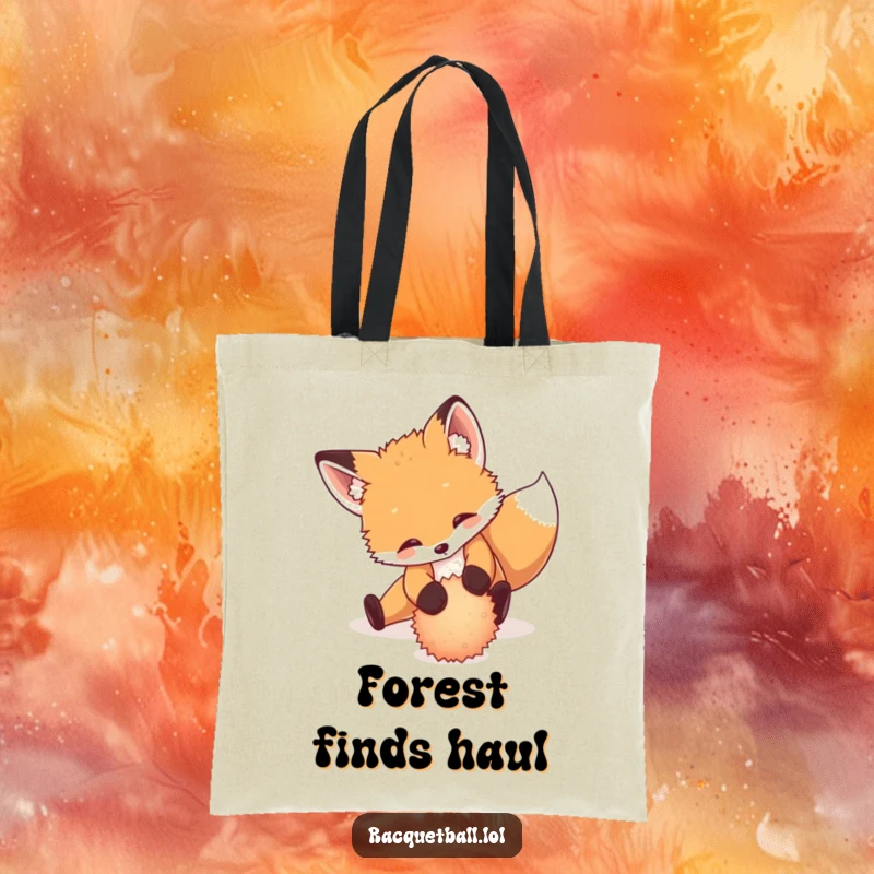 Funny tote bag showcasing a playful fox cub sliding dramatically to return a tiny, fuzzy ball, carrying capacity.
